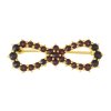 Silver brooch with czech garnet, gold plated - bow                                                  