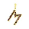 Silver pendant with czech garnet, gold plated - letter M                                            